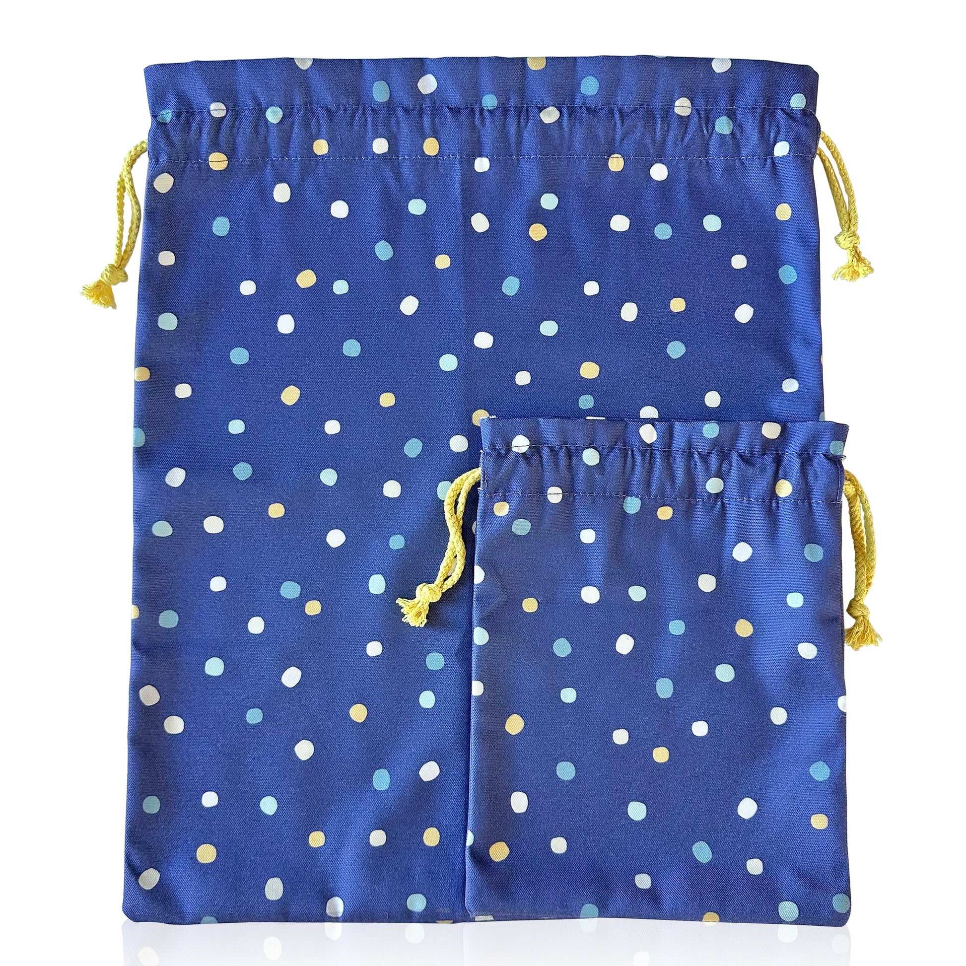 Two blue drawstring bags with colorful polka dots on a white background